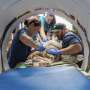 A 302-pound loggerhead sea turtle hit by a boat gets an oversize CT scan, with a surprise