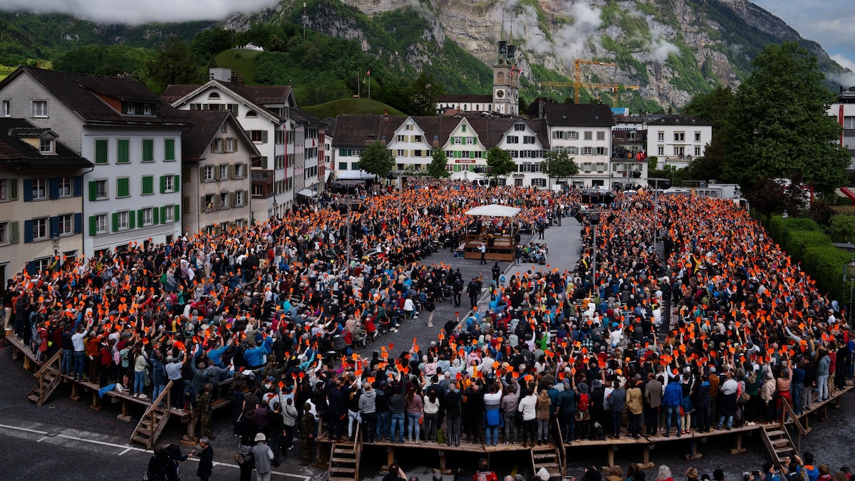 The small Swiss town where people still vote by hands in the air
