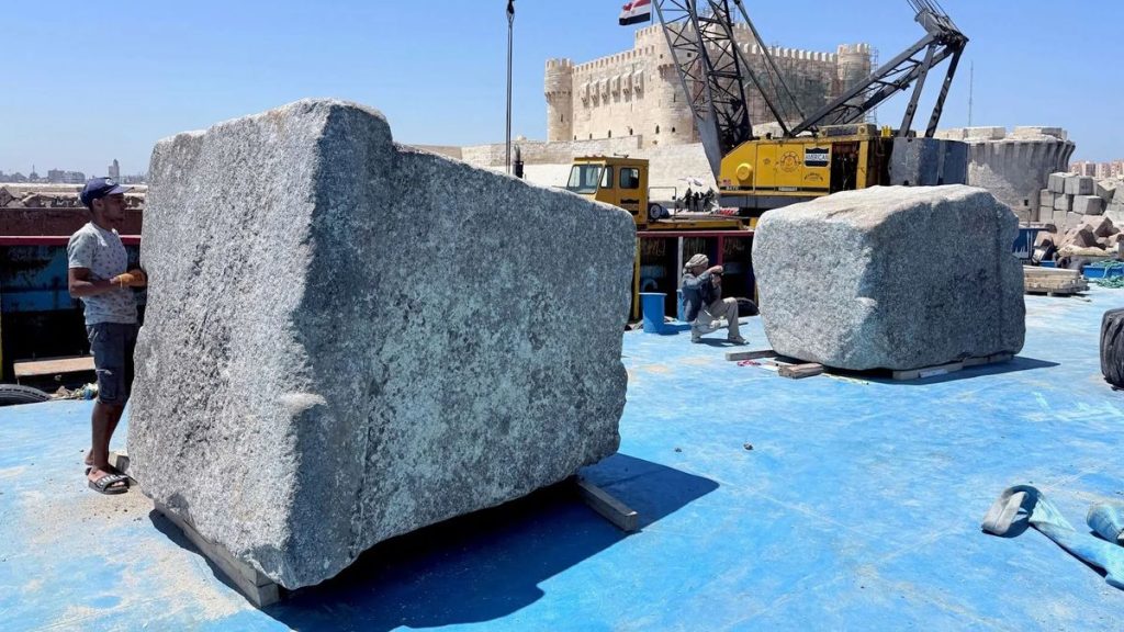 Massive blocks from the Lighthouse of Alexandria, an ancient wonder, hauled up from the Mediterranean