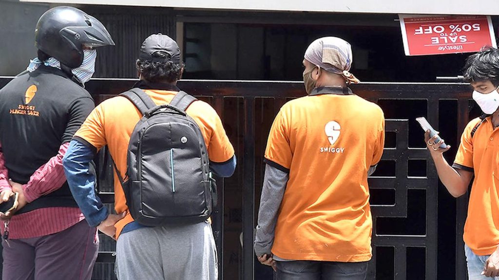 Delivery executive caught for driving with fake number plates to avoid fine