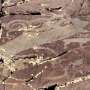Study reveals how ancient elk rock art transformed from realistic to warped wolf-like beasts
