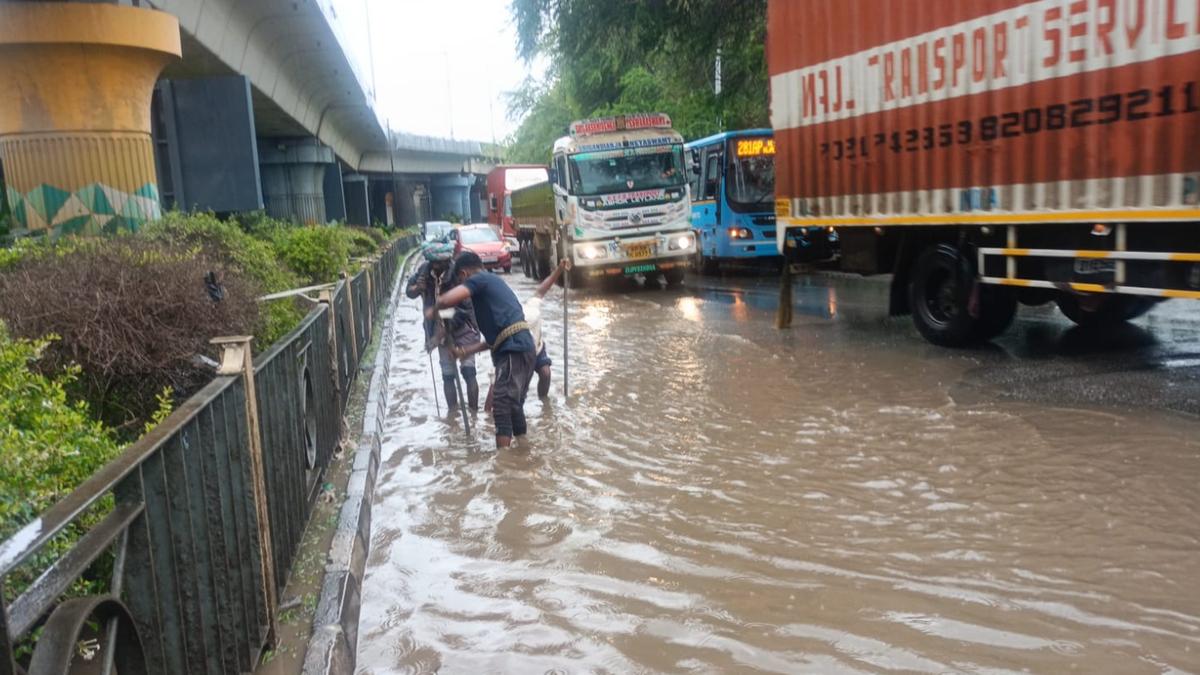 rain,-modi-visit-cripple-bengaluru-roads-on-rainy-sunday