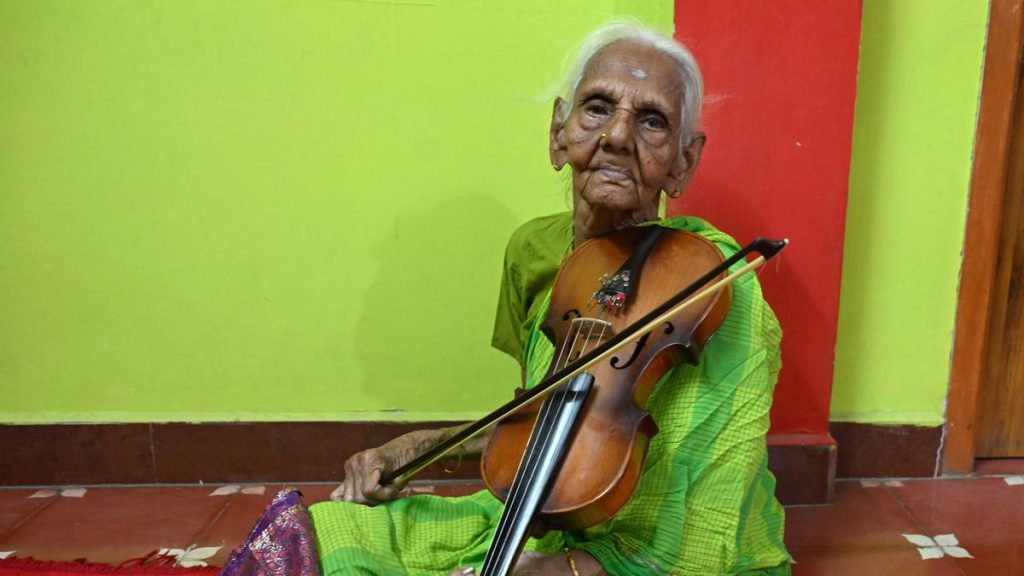 In a village of silence, her violin continues to sing for 80 years