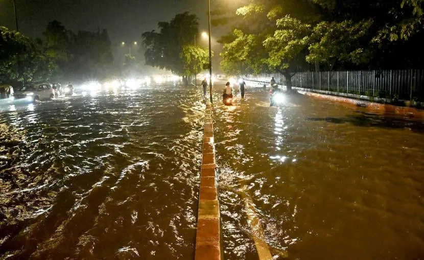 Delhi teen swept away in drain, search on