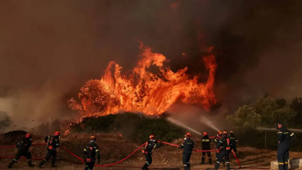 Two dead, hundreds flee as twin wildfires hit Greek island Salamina