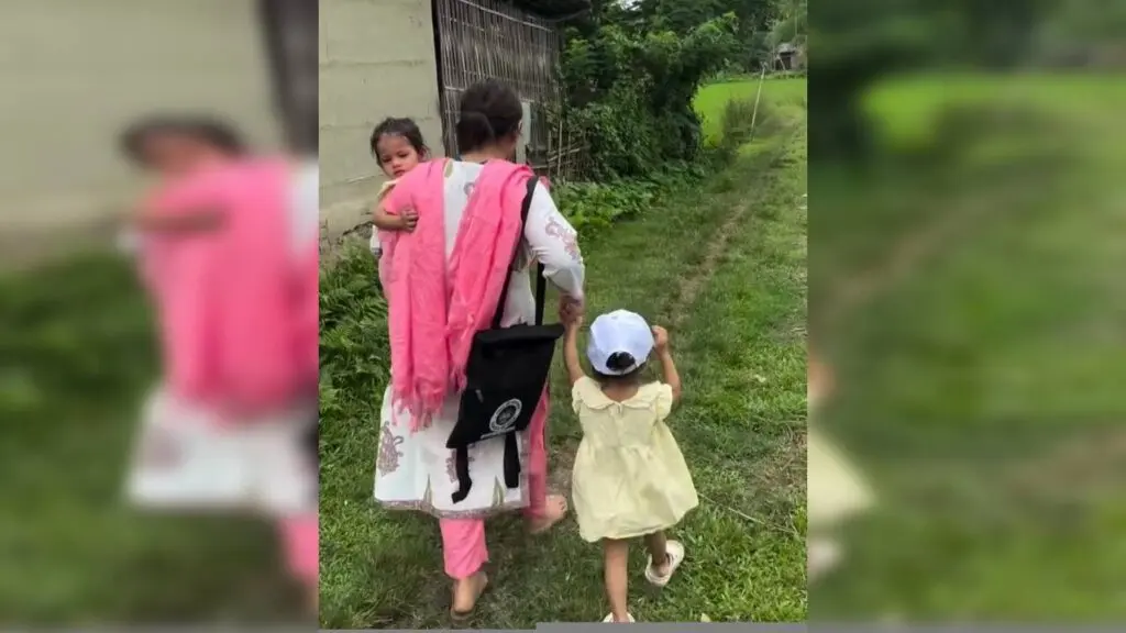 Assam teacher goes viral doing census duty with twins