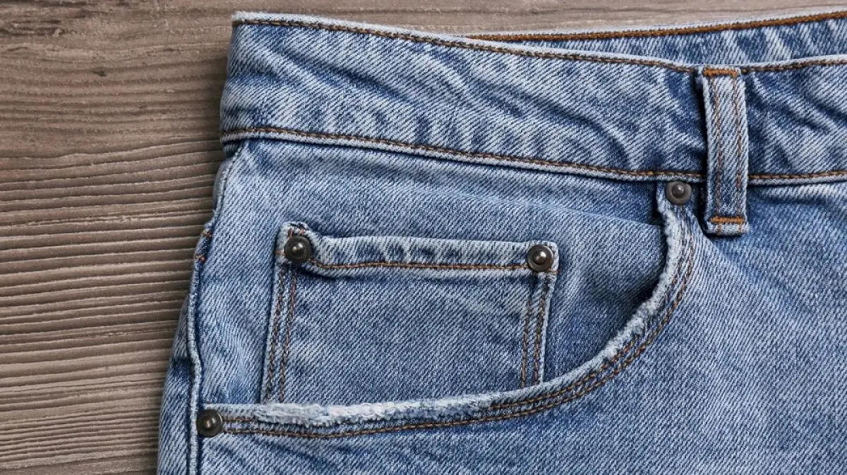 The tiny jeans pocket originally held pocket watches
