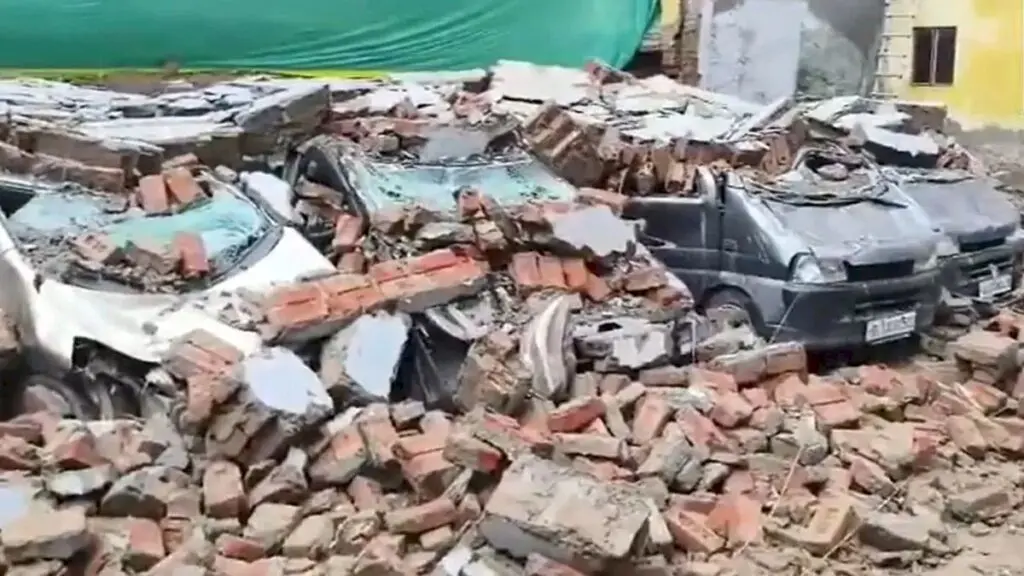 Delhi parking lot wall collapse damages 8 cars in Deoli