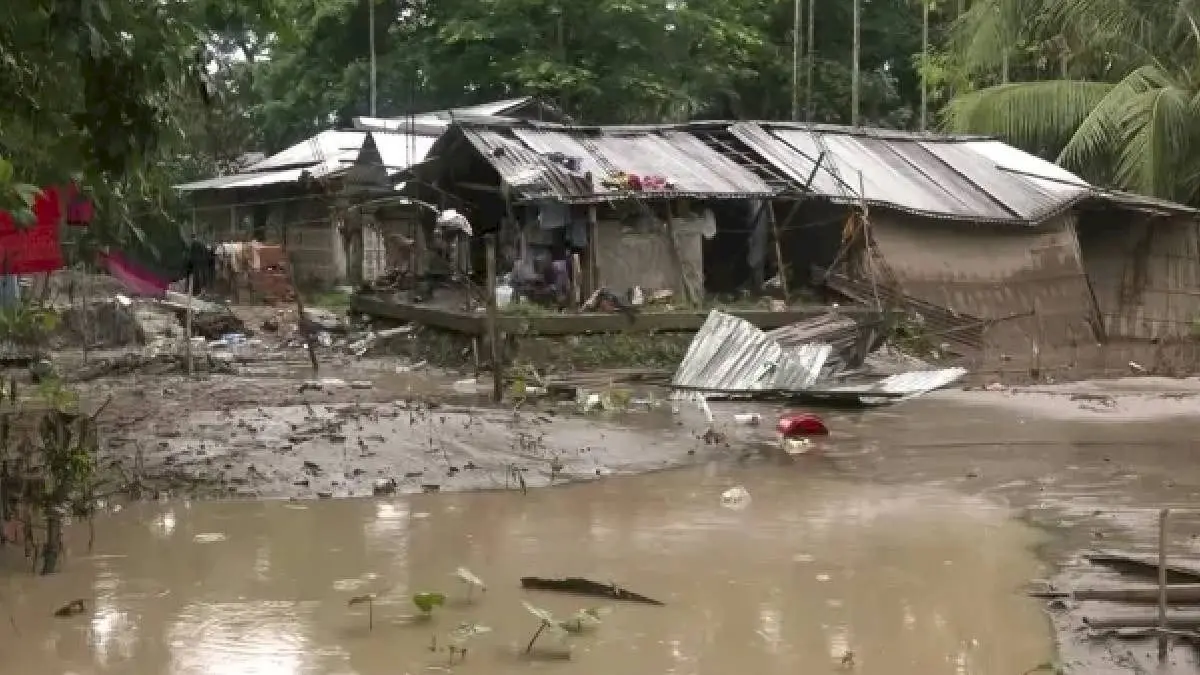 Assam flood victim returns to ruined home, fears repeat