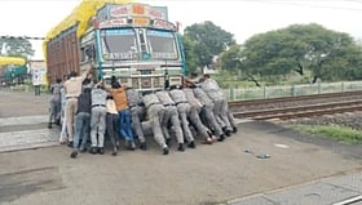 Police, locals push truck off track in Sagar, avert accident