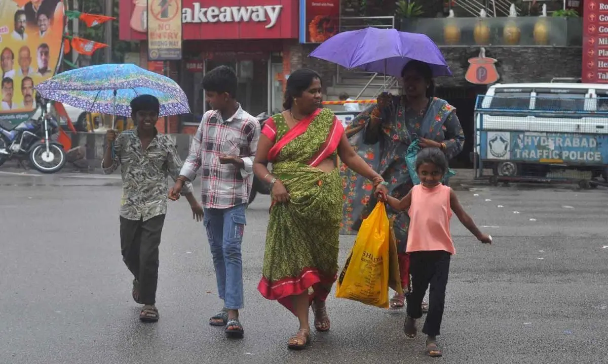 Heavy rains flood Telangana rivers, cut off villages