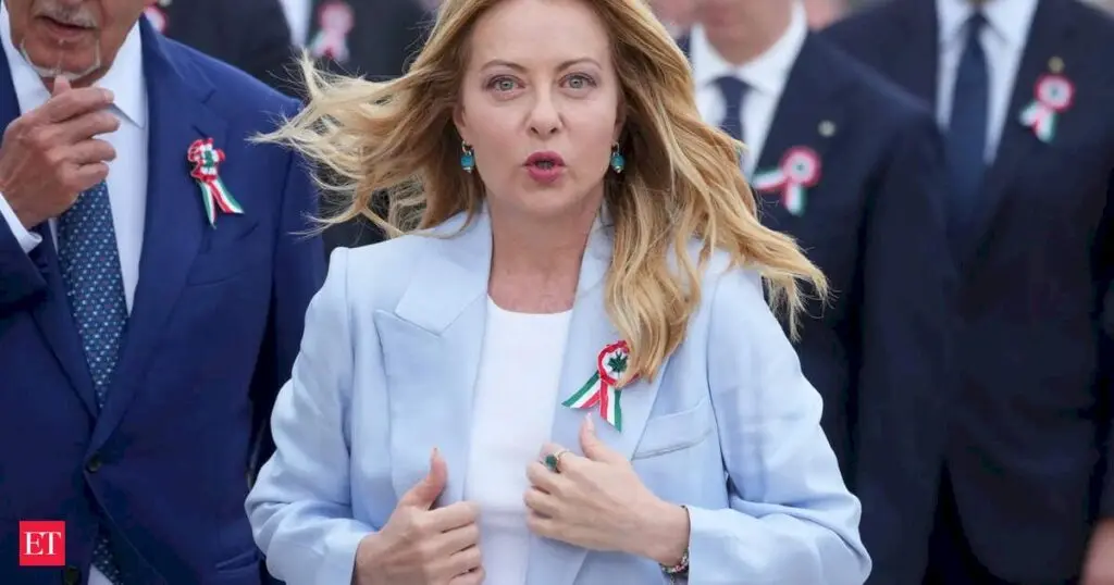 Giorgia Meloni swaps dark suits for pastels as image softens