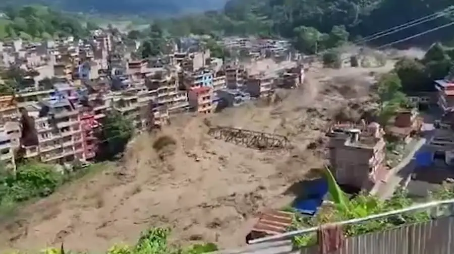 Nepal floods kill 16, 400 tourists missing, India on alert