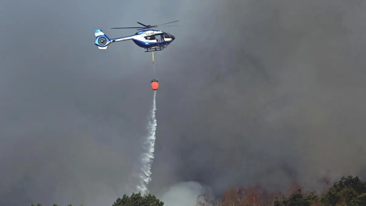Wildfire reaches German village, over 2,000 evacuated