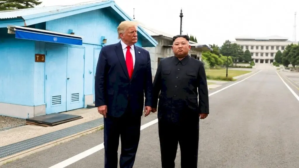 Trump posts old photo with Kim, says they 'get along GREAT'