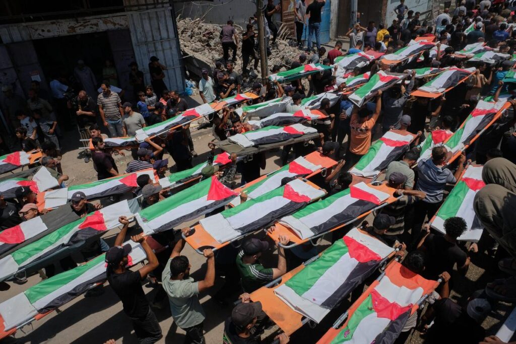Gaza funeral held for 112 bodies recovered from 2023 strike