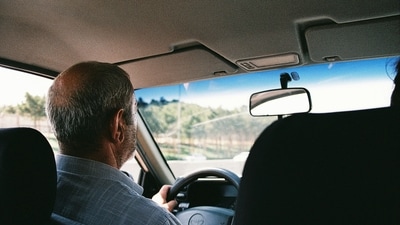 Professionals turn to cab driving after career setbacks and for new experiences