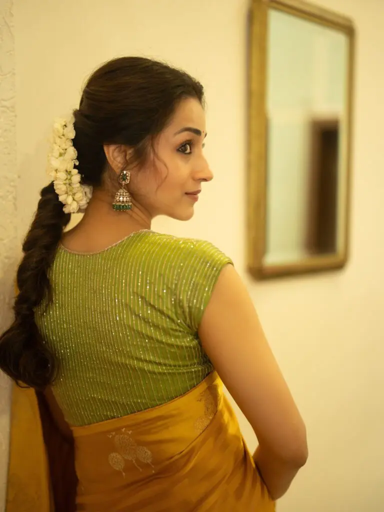 Trisha Krishnan wears mother's yellow saree at Independence Day event