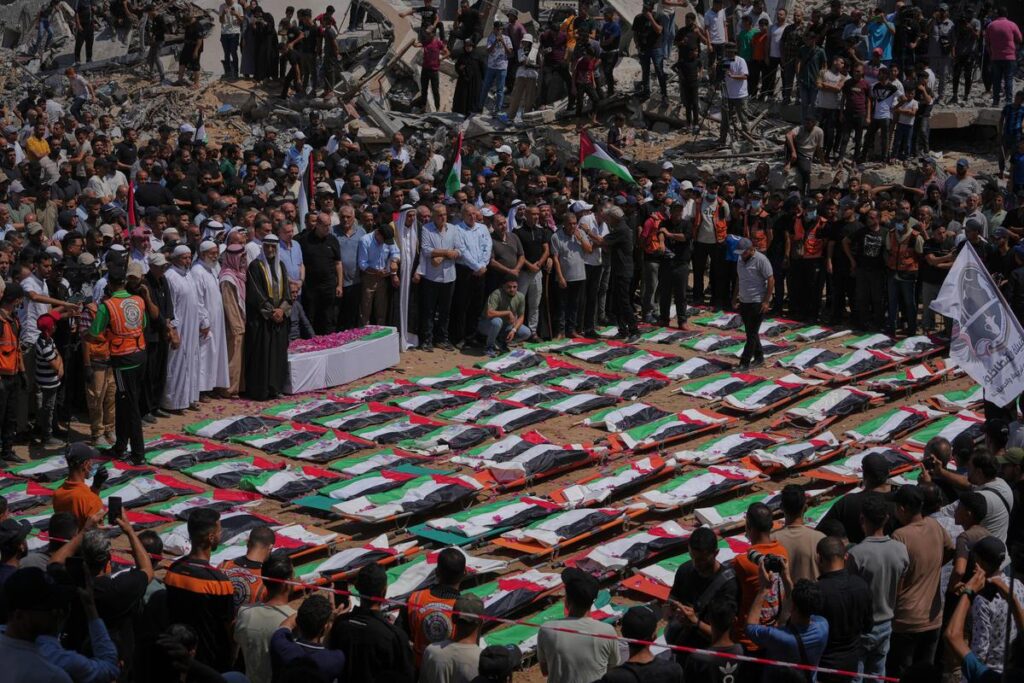 Gaza funeral held for 112 bodies recovered from 2023 strike