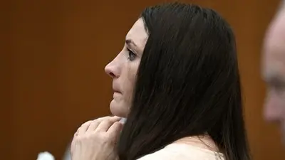 Lindsay Clancy cries as pathologist testifies in triple murder trial