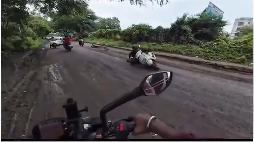 Nashik rider falls on pothole-ridden road, video viral