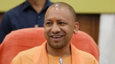 Yogi showers flower petals on Kanwariyas in Meerut