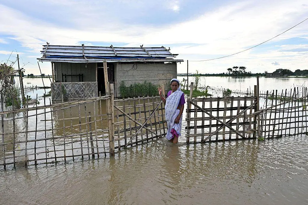 Woman carries 97-year-old mother-in-law on banana raft to escape Assam floods