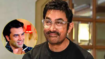 Aamir Khan recalls Dharmendra's shovel-like handshake, Big B his open home