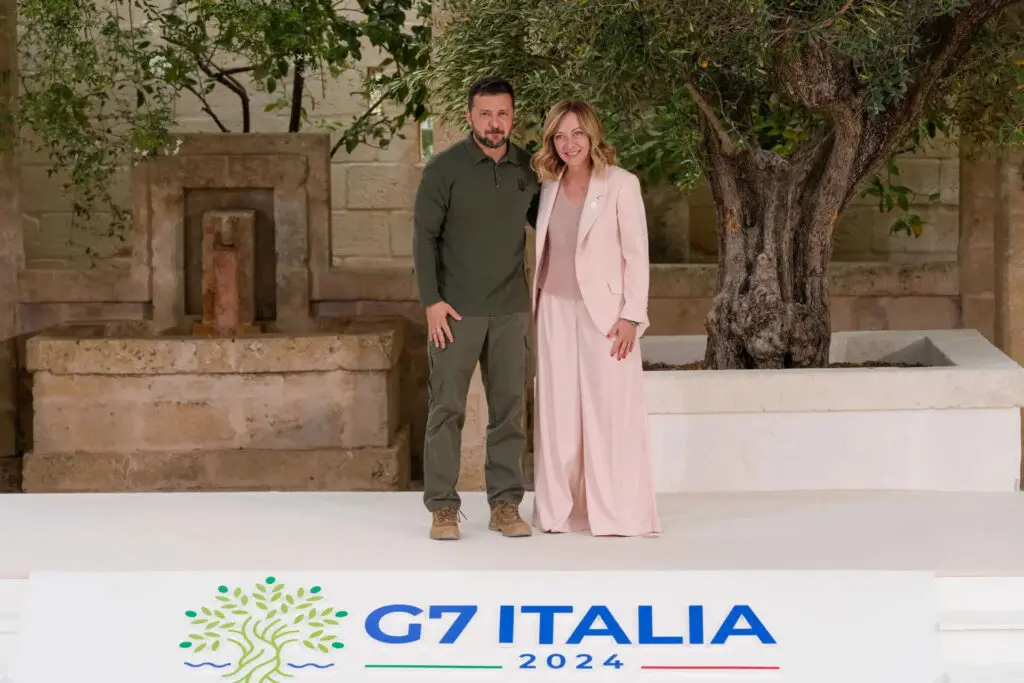 Giorgia Meloni swaps dark suits for pastels as image softens