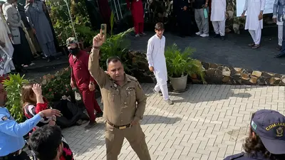 Pakistan army officer fires gun at student protest in Peshawar