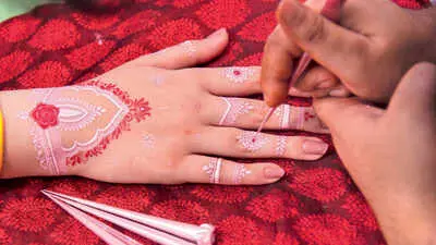 Pink and kundan mehendi trends emerge for Teej