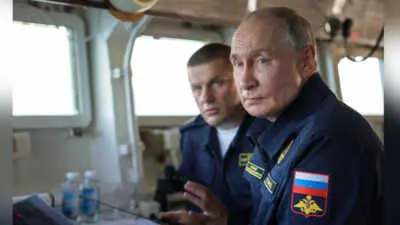 Putin visits disputed Kuril island, drawing Japan’s protest