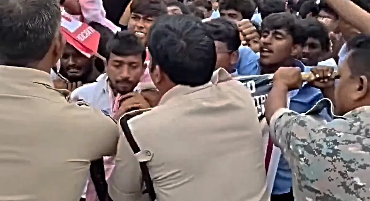 Telangana cop removed after grabbing students by throat