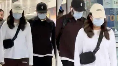 Virat Kohli and Anushka Sharma arrive at Delhi airport