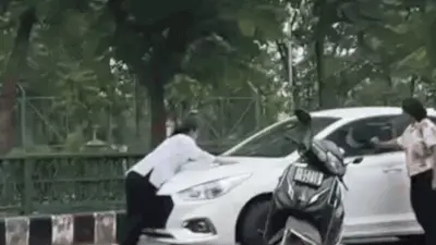 Lucknow woman dragged on car bonnet after confronting partner