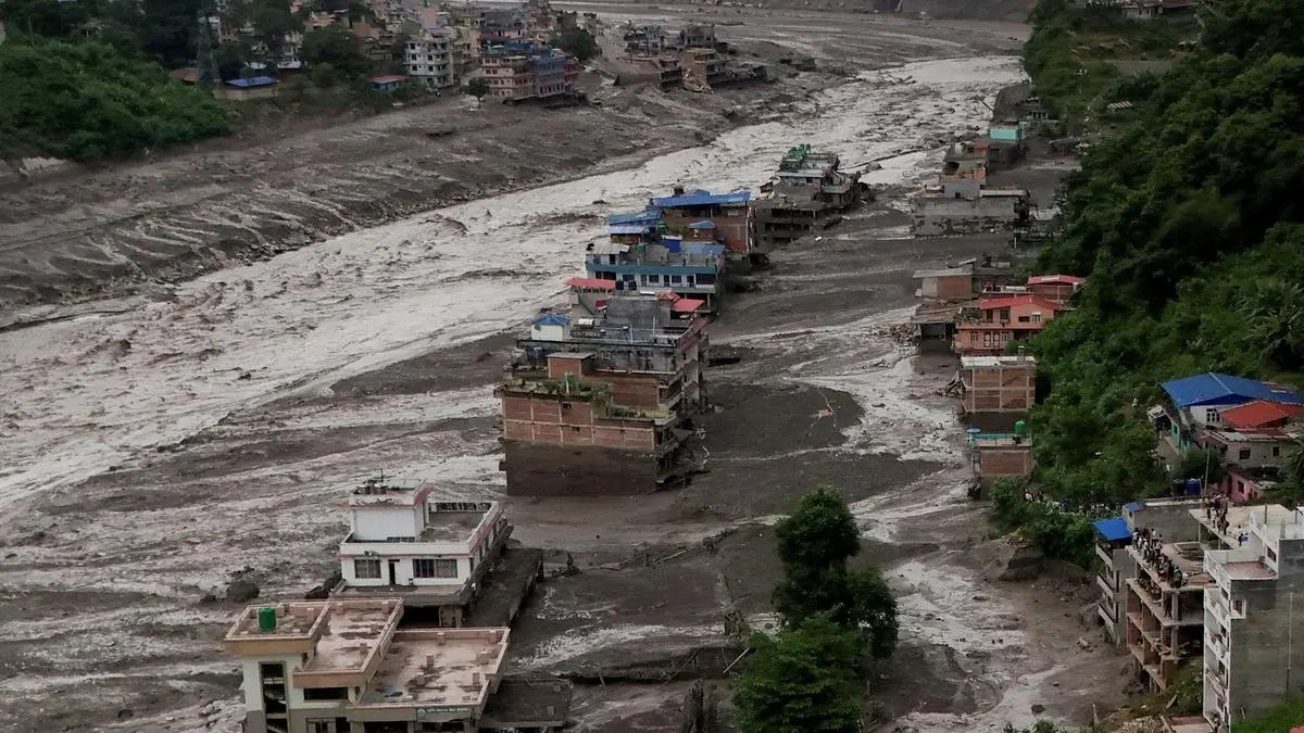 Nepal flash flood sweeps 35-plus houses, 5 missing after landslide