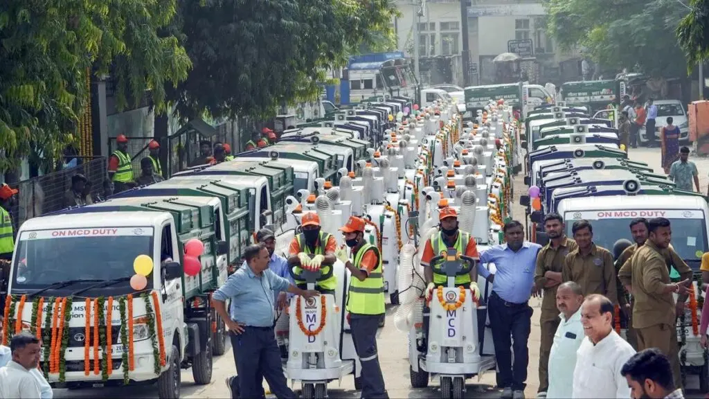 Delhi CM Gupta opens waste station, flags 35 women drivers